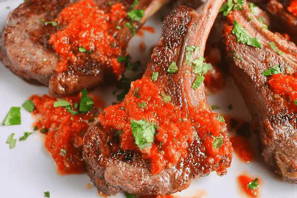 Herb Lamb Lollipops Romesco Twist